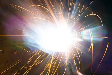 Welding sparks and smoke worker robot