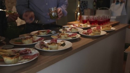 Preparation of starter with cured meats and asparagus, Italy