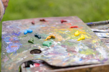 Drawing with oil paints on the nature. Wonderful hobby