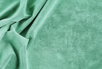 velvet texture neo mint color background, expensive luxury fabric, material,  wallpaper. copy space