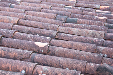 The texture of the roof of old clay tiles