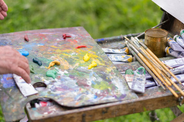 Drawing with oil paints on the nature. Wonderful hobby