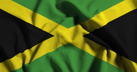 National flag of Jamaica on a waving cotton texture background