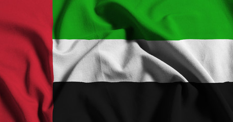 Obraz premium National flag of UAE on a waving cotton texture background