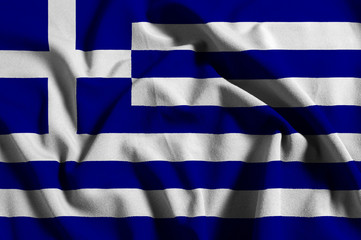 National flag of Greece on a waving cotton texture background