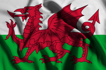 National flag of Wales on a waving cotton texture background
