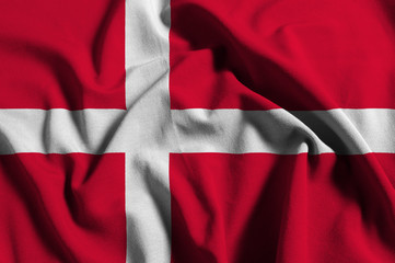 Fototapeta premium National flag of Denmark on a waving cotton texture background