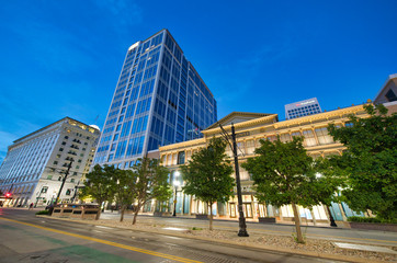 Obraz premium SALT LAKE CITY, UT - JULY 13, 2019: Downtown city streets at night. Salt Lake City was founded by Mormons