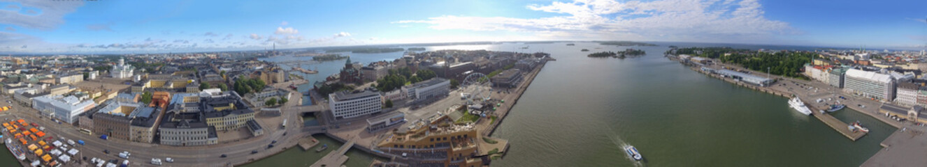 Panoramic sunset aerial view of Helsinki skyline from city port in summer season
