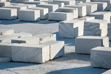 Large rectangular blocks of white Carrara marble