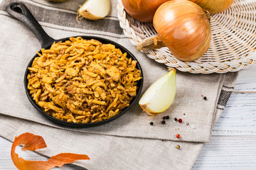 Crispy Fried Onion Strings Background. Selective focus.