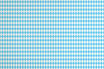 Oktoberfest bakcground with blue Barvarian check pattern, flag of Bavaria on white babric canvas for Germany national festival celebration