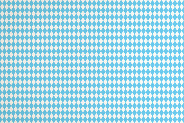 Oktoberfest bakcground with blue Barvarian check pattern, flag of Bavaria on white babric canvas...