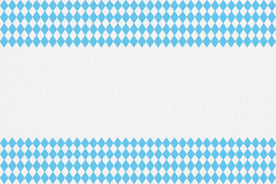 Oktoberfest background with blue Bavarian check seamless pattern, flag of Bavaria on white fabric canvas for Germany national festival celebration party