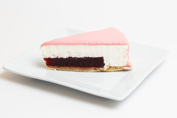 piece of cake on a plate on white background