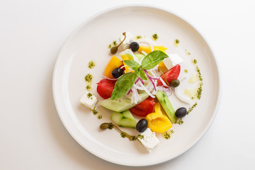 greek salad on white background