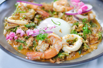 spicy salad or spicy winged bean salad with shrimp and squid