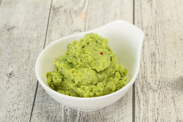 Avocado guacamole sauce with chili pepper