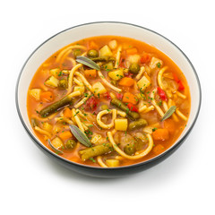 Vegetarian Vegetable Soup Isolated on a white background. Selective focus.