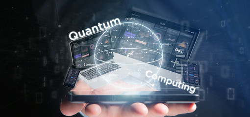 Businessman holding Quantum computing concept with qubit and devices 3d rendering