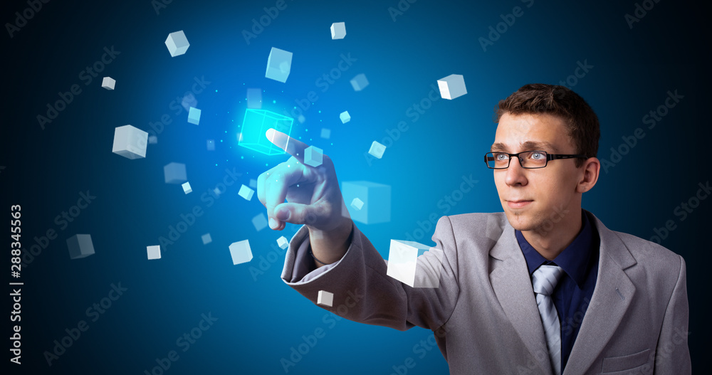 Poster Man touching hologram screen displaying cube symbols