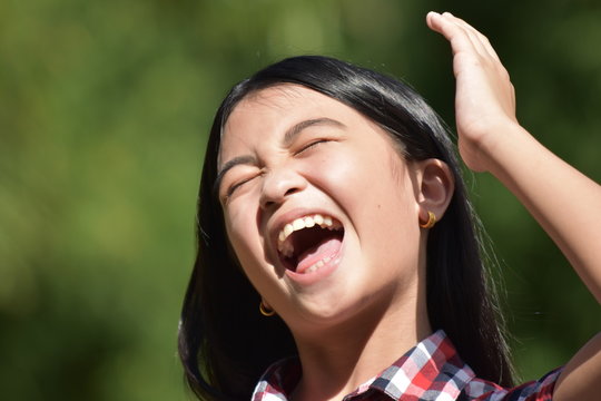 A Petite Diverse Preteen And Laughter