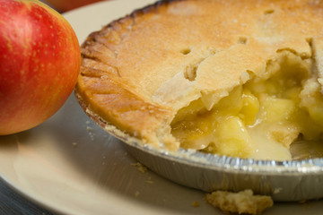 Classic apple pie dessert with fillings and fresh ripe apples