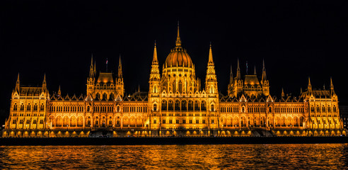 Fototapeta na wymiar Hungarian Parliament Building and Danube River in Budapest. Night cityscape