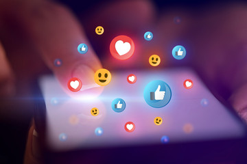 Finger touching phone with social media concept and dark background