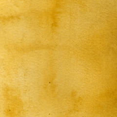 Yellow autumn watercolor texture with abstract washes and brush strokes on the white paper background. Chaotic abstract organic design.