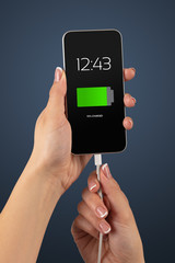 Elegant hand charging smartphone with low battery