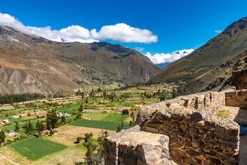 Ollantaytambo ruins in central Peru and a view into the valley