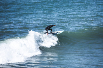 Surfer at the Pacific Ocean