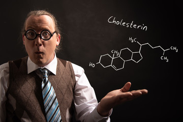 Professor presenting handdrawn chemical formula of Cholesterol