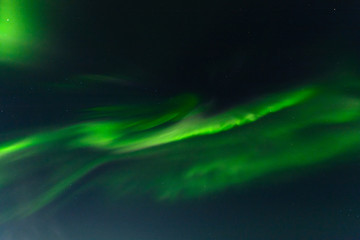 Obraz na płótnie Canvas Northern lights, aurora in the sky at night.Horizontal .