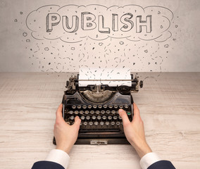 First person perspective hand writing on typewriter with cloud message concept