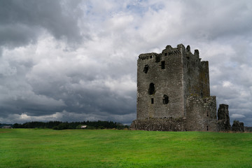 Scottish castle ruin with stormy clouds