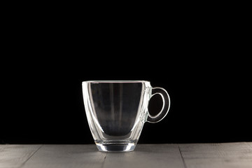 glass cup on a black background