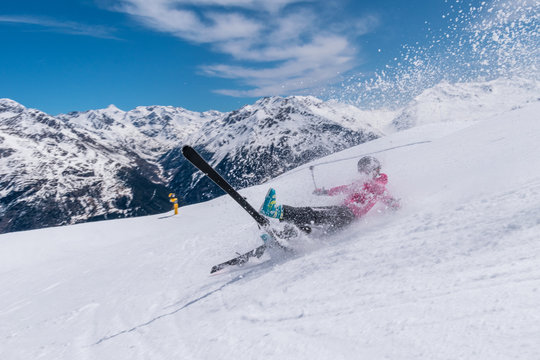 Woman skier accident crash on a ski slope with ski flying, Solden, Austria