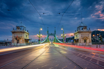 Naklejka na ściany i meble Budapest, Hungary. Cityscape image of Budapest with Liberty Bridge during twilight blue hour.