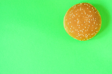 burger bun (wheat sesame seed bun) menu concept. food background. copy save. Top view