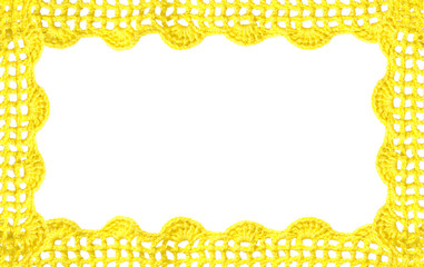 crocheted yellow lace on a golden background.