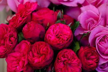 Fototapeta na wymiar Bouquets of peonies. Sale of flowers in a flower shop. Pink flowers