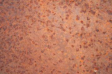 Abstract background of surface of a quarry stone with iron streaks