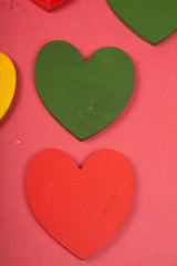 love colorful hearts on a red background
