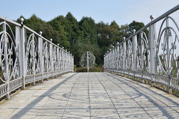 bridge with forged railing in the form of a road