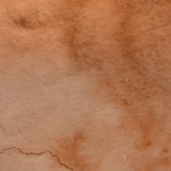 Orange watercolor abstract background with waves and strokes on white paper background. Trendy look. Chaotic abstract organic design.