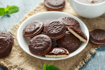 Jaffa cakes sweet cookies with orange, chocolate and coffee