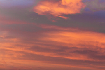 Colorful dramatic sky at sunset with pasted clouds