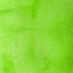Watercolor green texture with abstract washes and brush strokes on the white paper background. Digital paper background.
